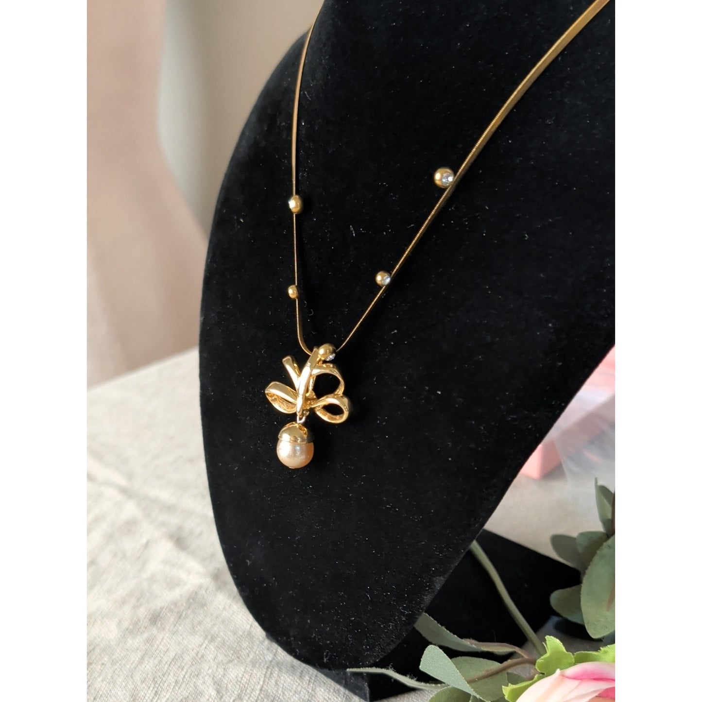 Vintage 1990s Nolan Miller Gold Tone Bow Necklace Faux Pearl Drop CZ Snake Chain