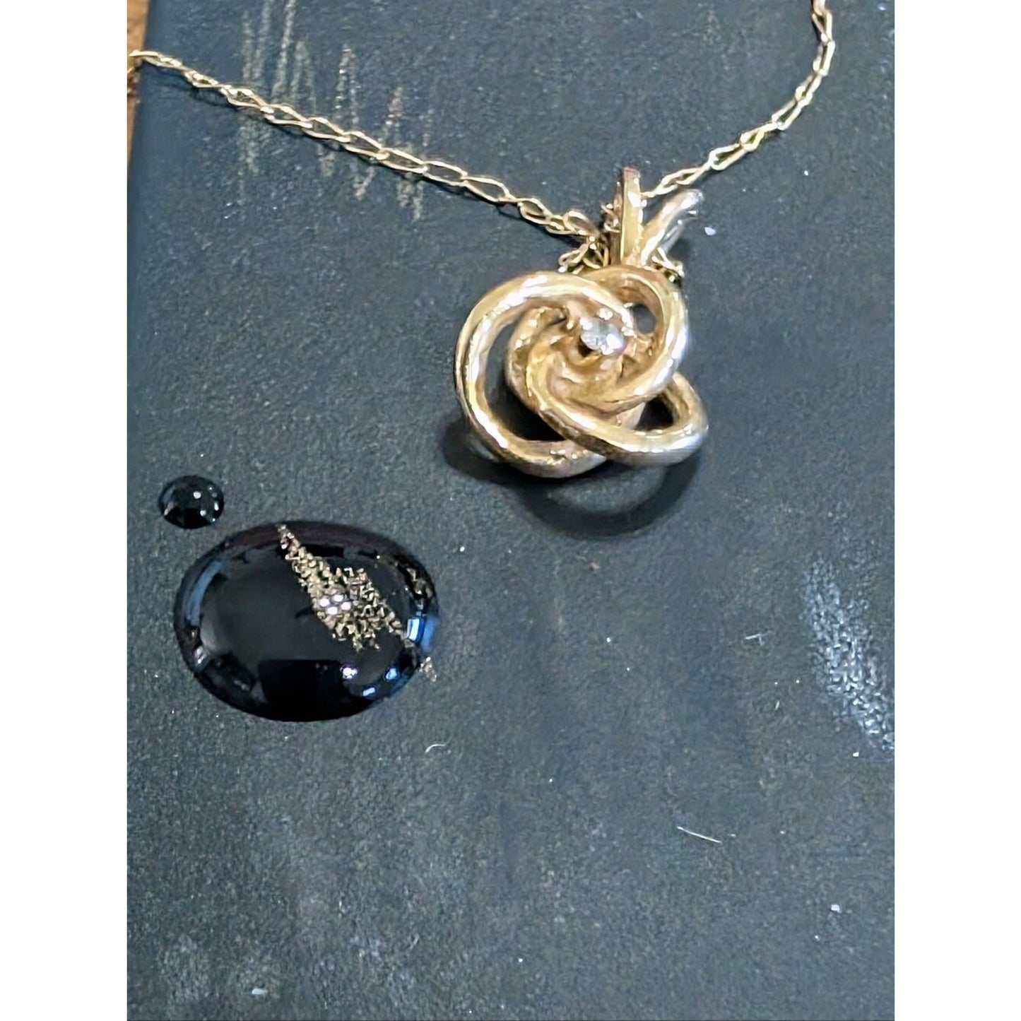 Vintage Small 14k Yellow Gold .02ct Diamond Interlocking Knot Solitaire Pendant