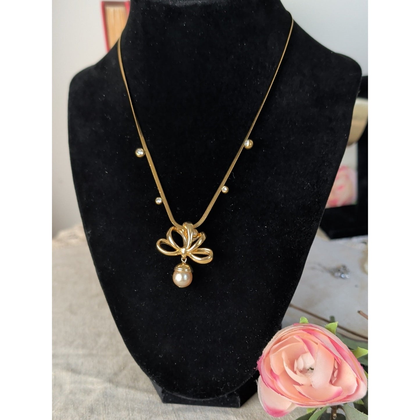 Vintage 1990s Nolan Miller Gold Tone Bow Necklace Faux Pearl Drop CZ Snake Chain