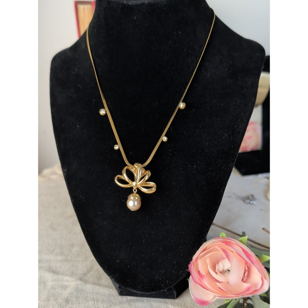 Vintage 1990s Nolan Miller Gold Tone Bow Necklace Faux Pearl Drop CZ Snake Chain