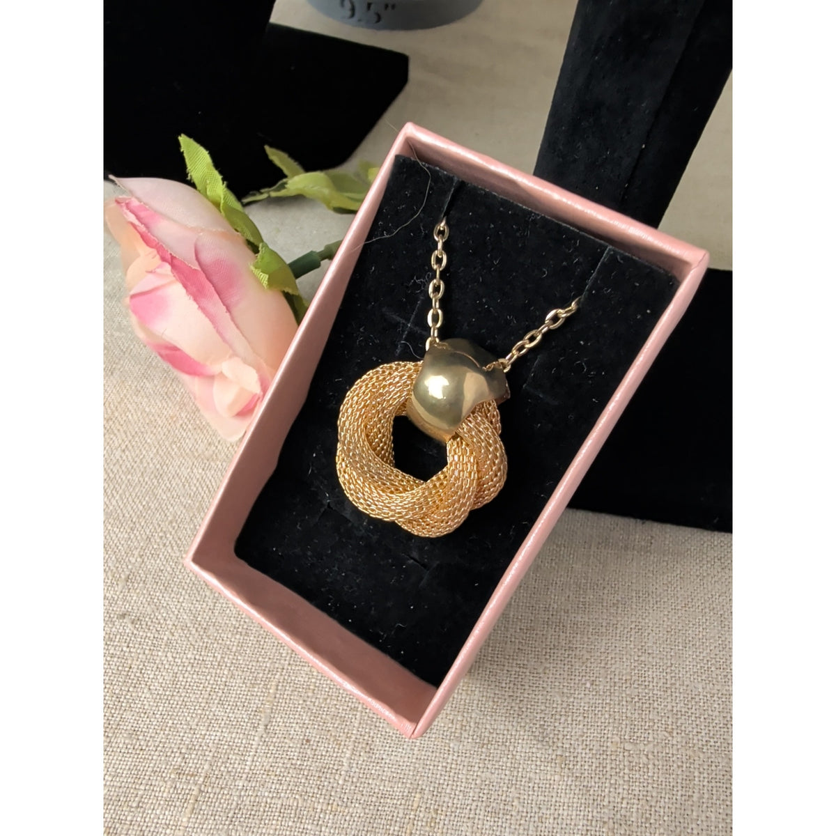 Elegant Gold-Tone Twisted Knot Pendant Necklace