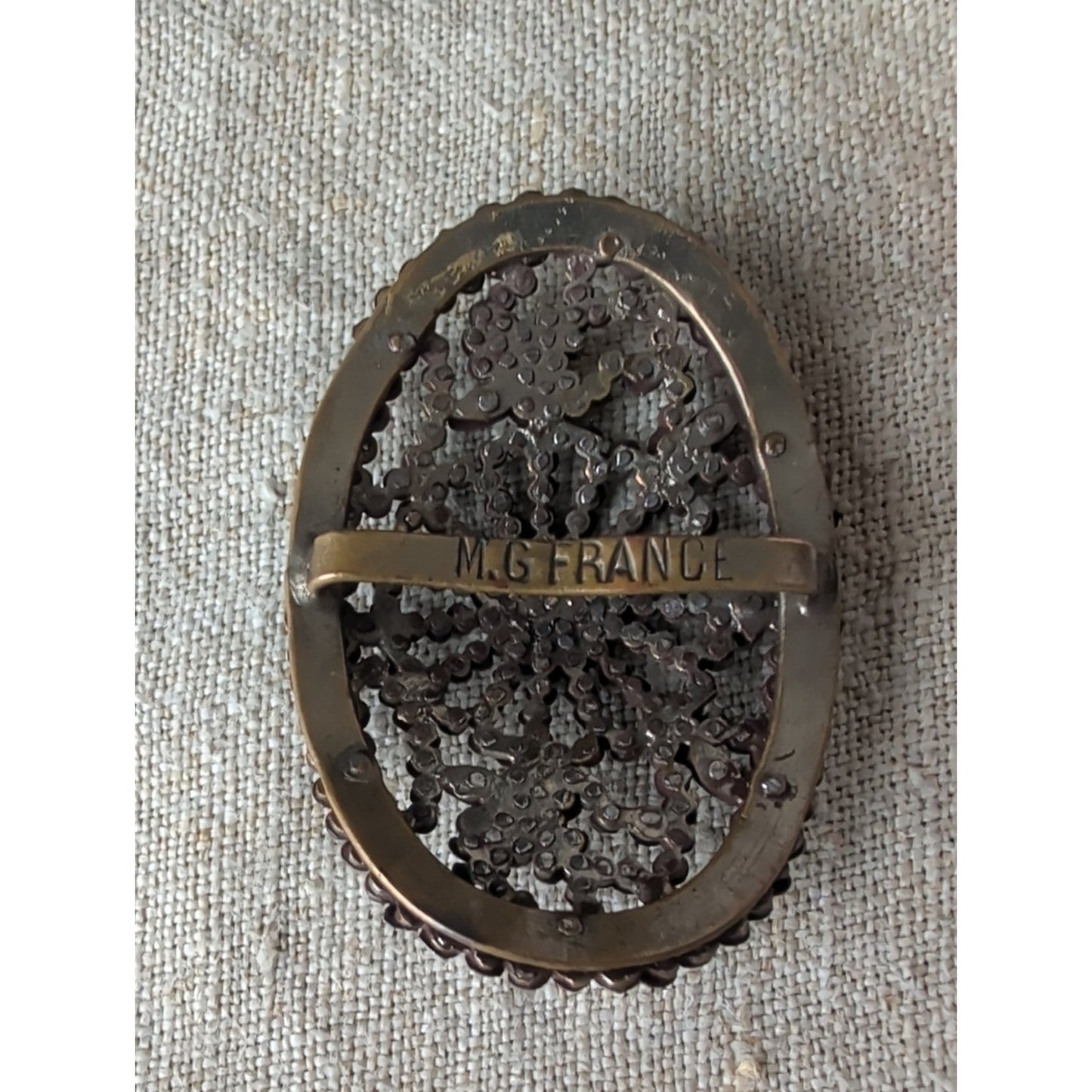 Vintage M.G. France Oval Cut Steel Style Belt Buckle French Floral Starburst