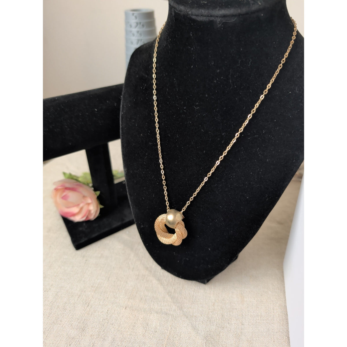 Elegant Gold-Tone Twisted Knot Pendant Necklace