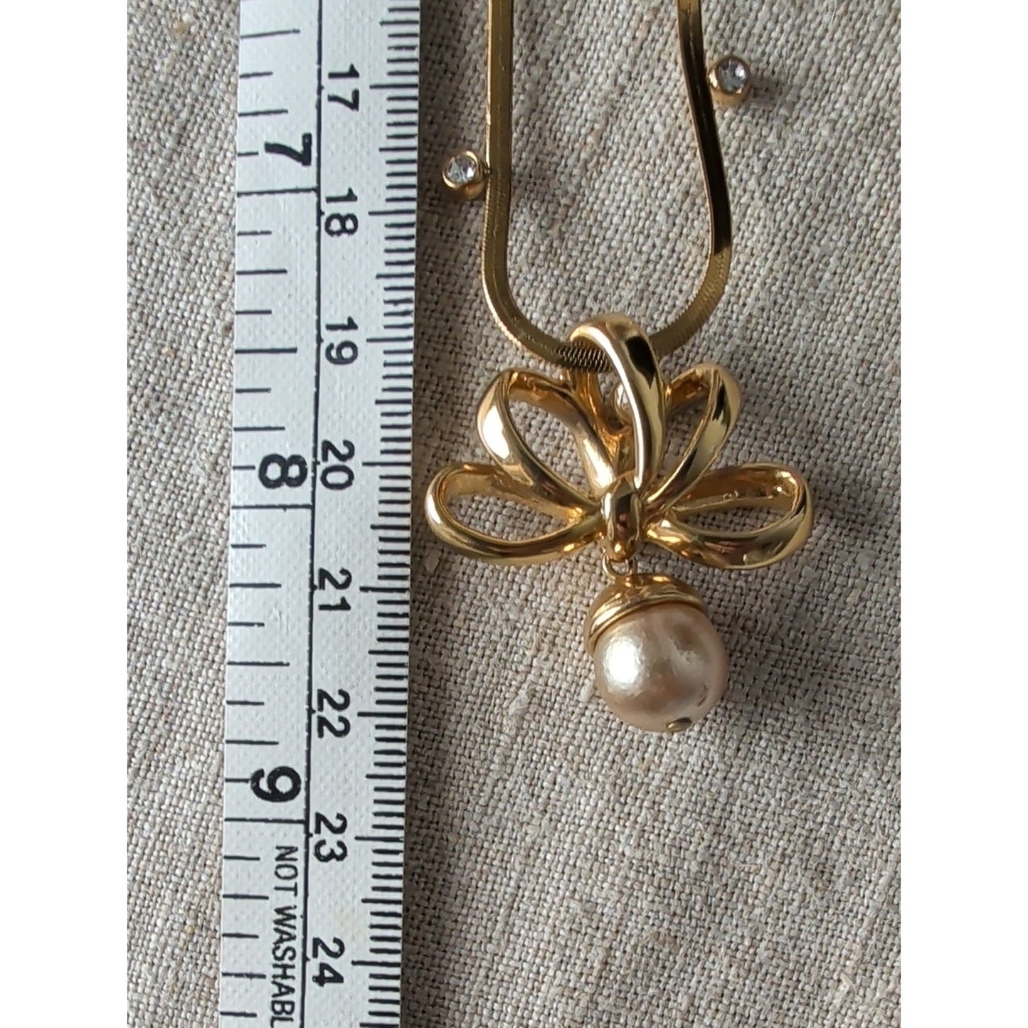 Vintage 1990s Nolan Miller Gold Tone Bow Necklace Faux Pearl Drop CZ Snake Chain