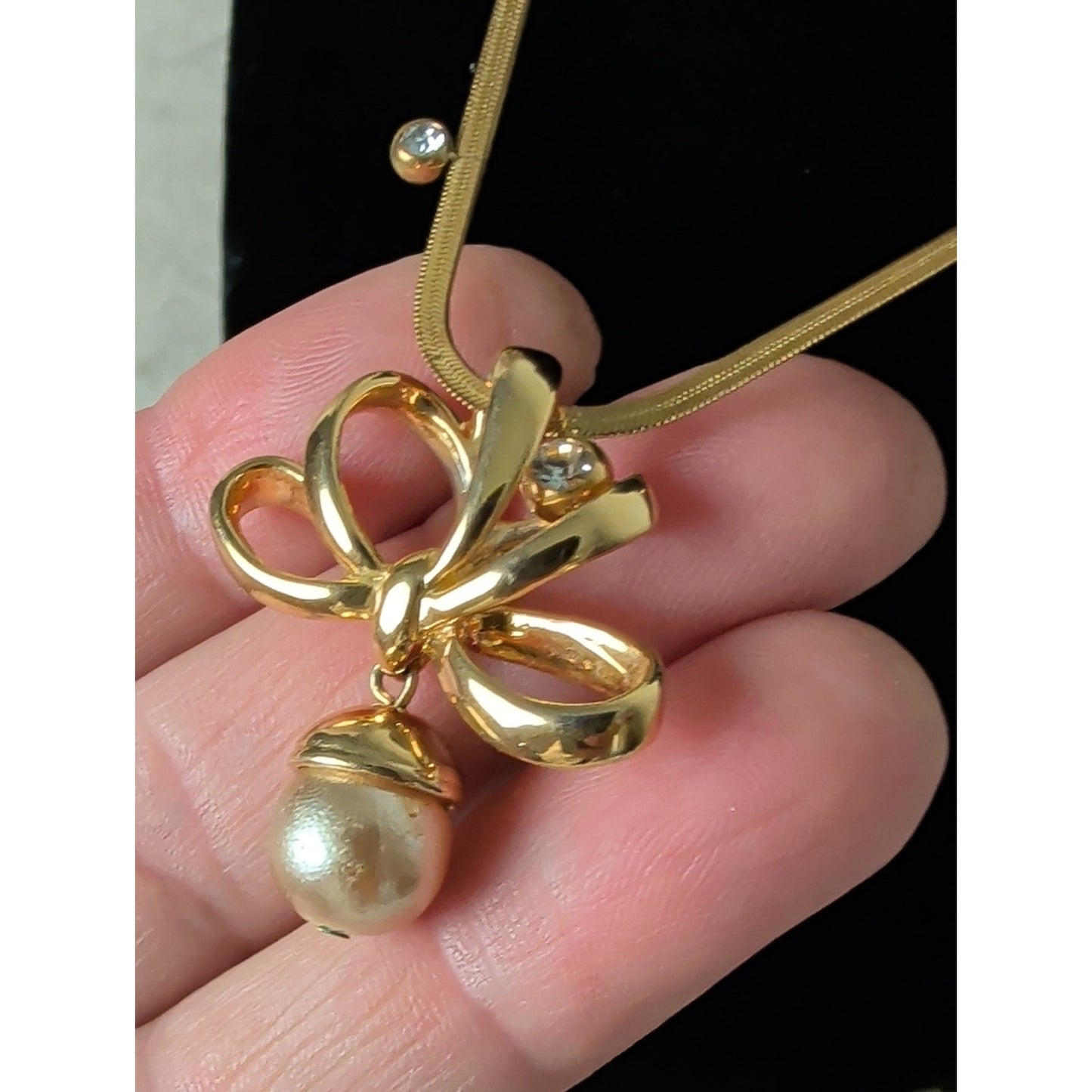 Vintage 1990s Nolan Miller Gold Tone Bow Necklace Faux Pearl Drop CZ Snake Chain