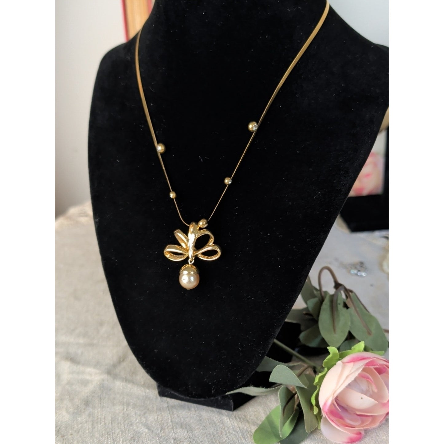 Vintage 1990s Nolan Miller Gold Tone Bow Necklace Faux Pearl Drop CZ Snake Chain