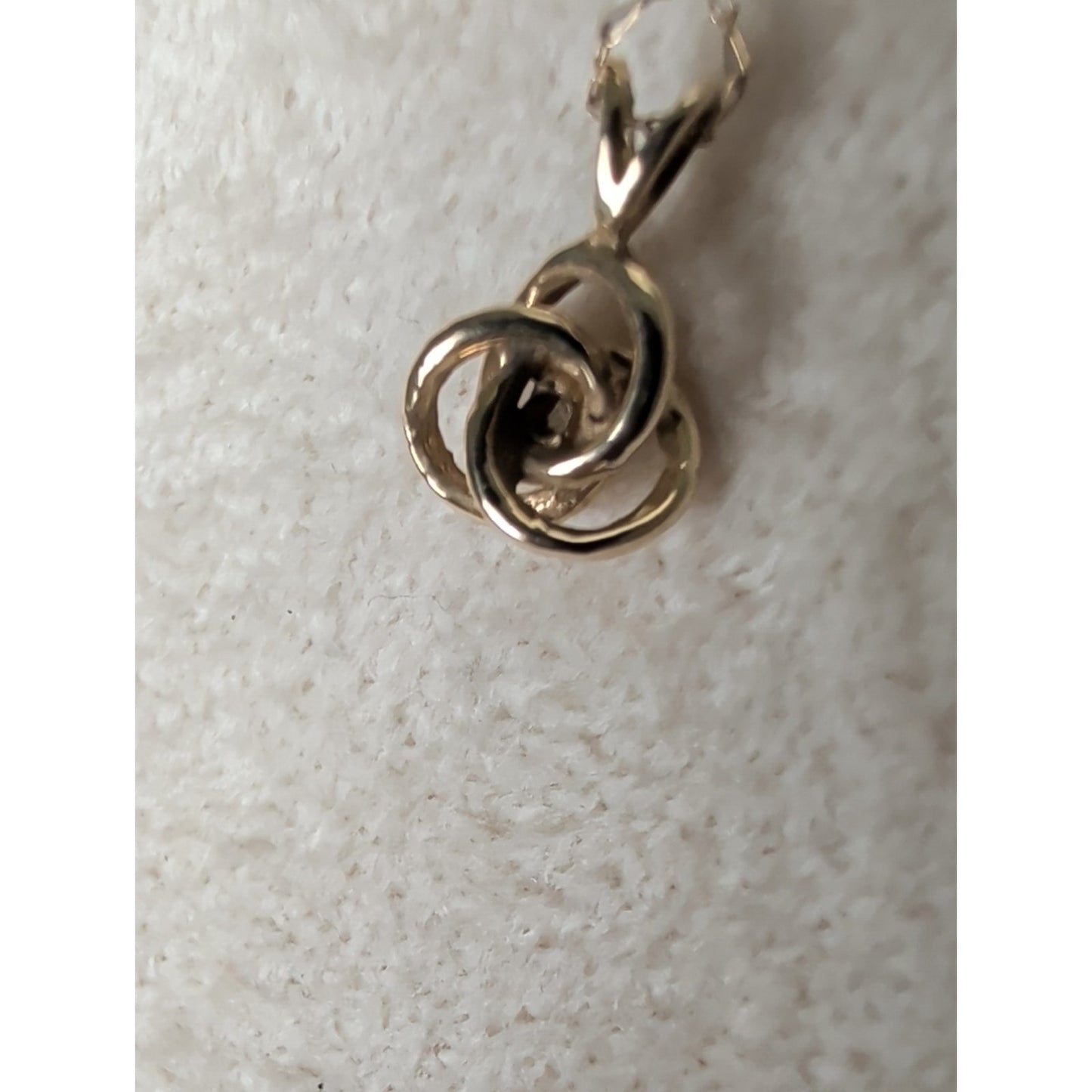 Vintage Small 14k Yellow Gold .02ct Diamond Interlocking Knot Solitaire Pendant