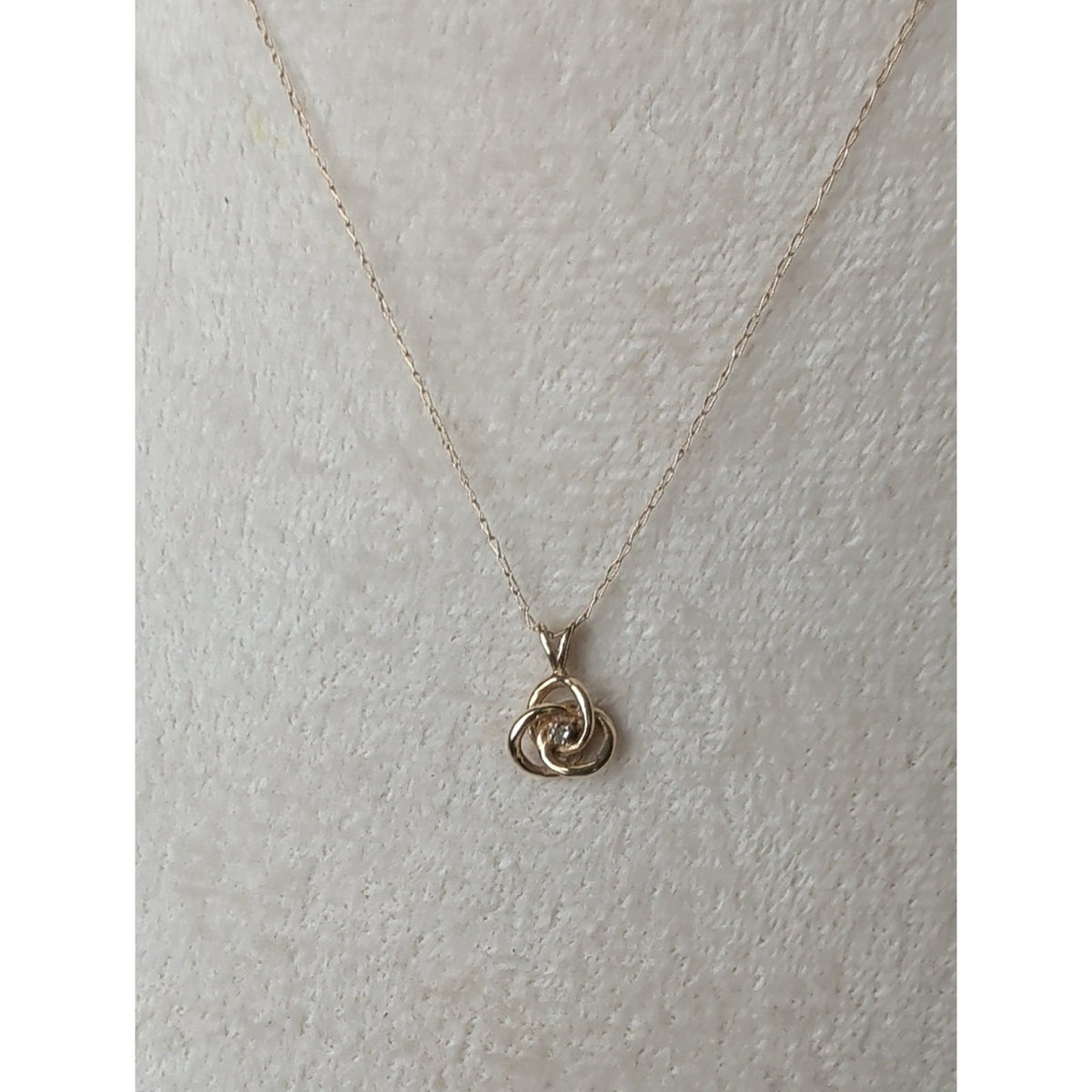 Vintage Small 14k Yellow Gold .02ct Diamond Interlocking Knot Solitaire Pendant