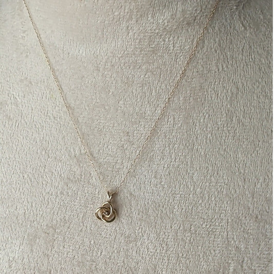 Vintage Small 14k Yellow Gold .02ct Diamond Interlocking Knot Solitaire Pendant